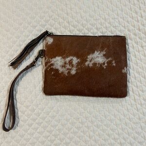 Brown and White Cowhide Wristlet Clutch